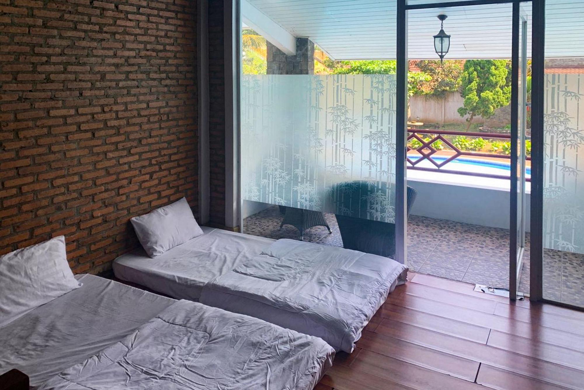 Urbanview Hotel Villa Q Gisting Bandjarnegeri Εξωτερικό φωτογραφία